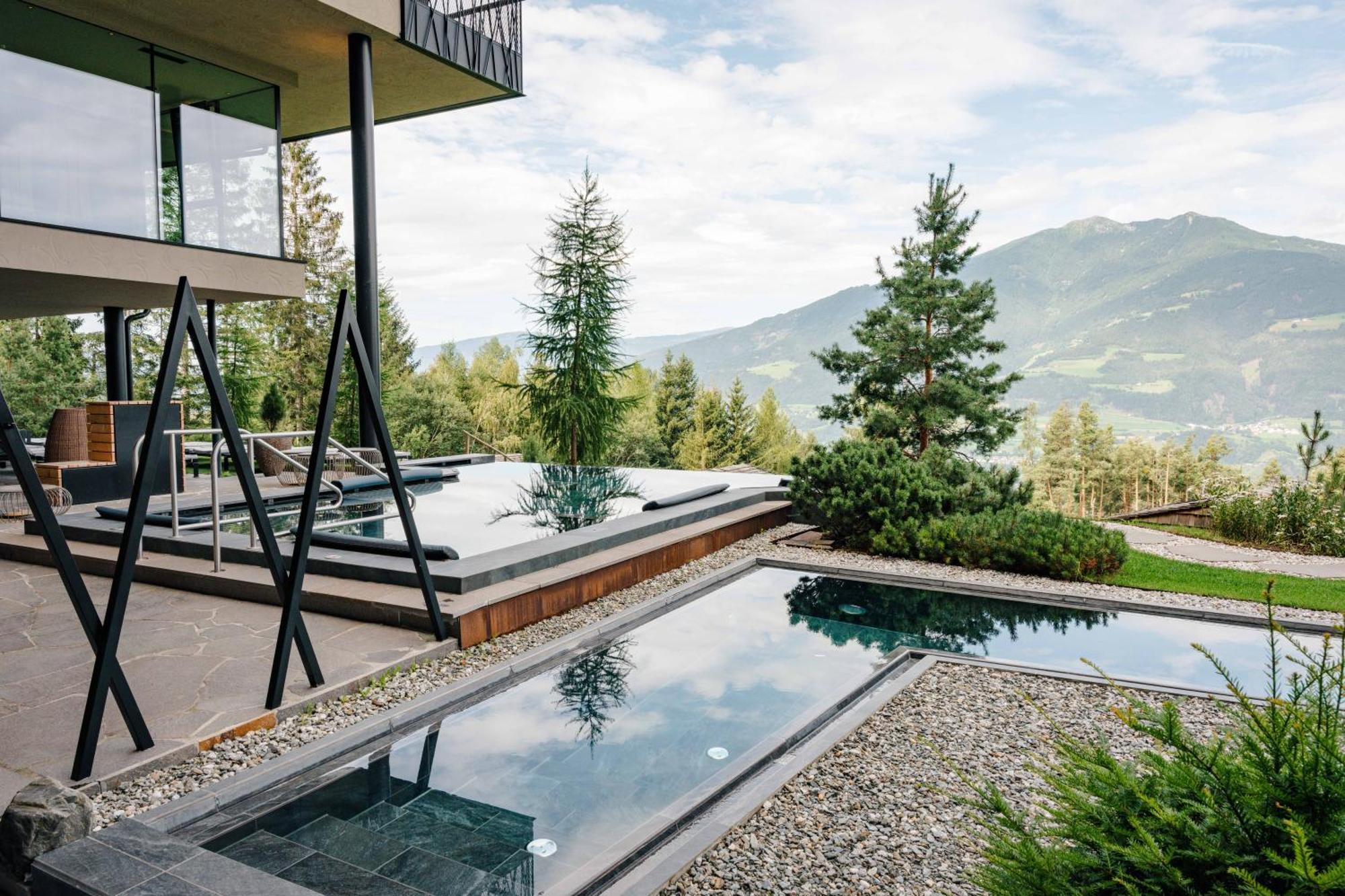 My Arbor - Dolomites Hotell Brixen Exteriör bild A private swimming pool in the Alps